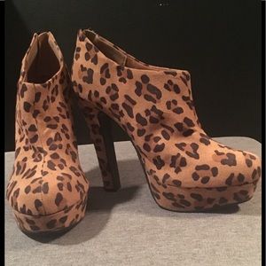 Leopard print ankle boots.